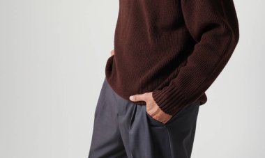 Smiling young man posing in the studio. Mind set and mental health. High quality photo.