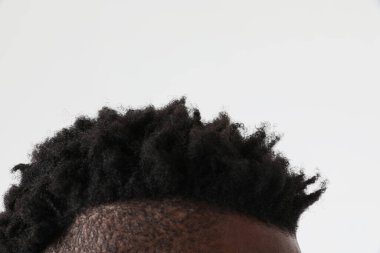 Close-up portrait of afro hair male cut. Mock-up. Isolated. High quality photo.