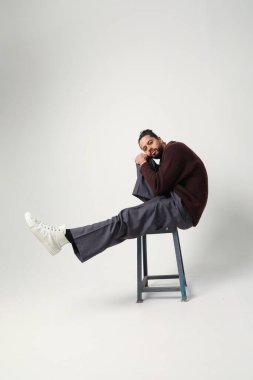 Portrait of handsome bearded man with curly hair. Mind set and mental health. High quality photo.