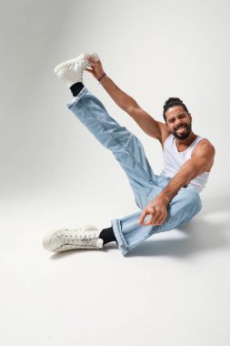 Portrait of happy young man, with curly hair. Mind set and mental health. . High quality photo.