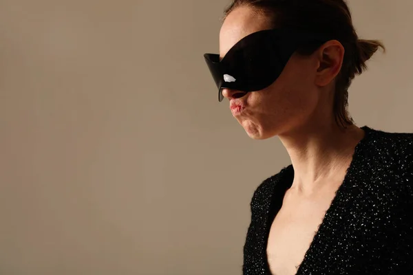 stock image Vertical portrait of confident young woman wearing sunglasses posing indoor. High quality photo.