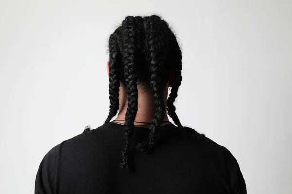Black teen male portrait with hair done in a plat style Stock