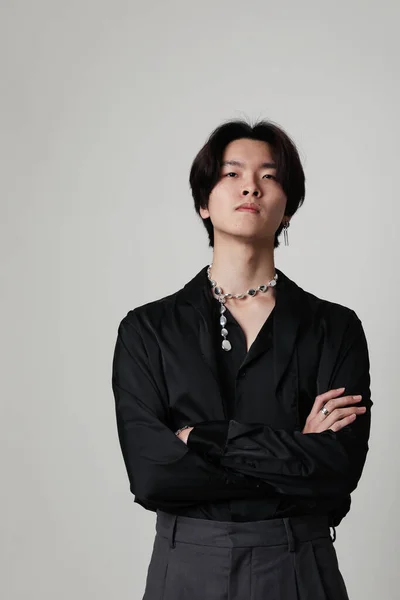 Mind set and mental attitude. Close-up of young Asian man posing indoor. High quality photo.