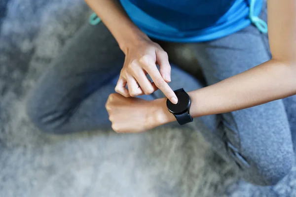 stock image Health care, heart rate monitor, portrait of Asian beautiful woman using smart watch to select health programs such as yoga, cardio exercises, breathing meditation. to prepare before the activity.