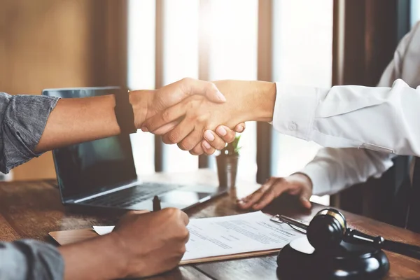 stock image Guarantees, Mortgages, Signings, Insurance, contract, agreement concept, Real Estate Agents are shaking hands with customers to congratulate them after landing a deal.