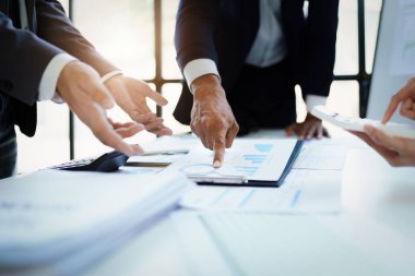 business group people meeting and discuss, plan financial budgets for investments, planning new marketing strategies to fight with competitors.