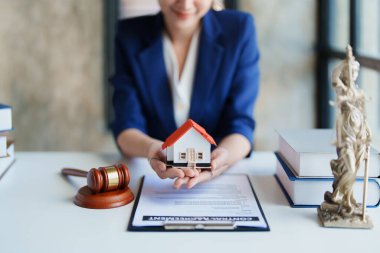 Law, Consultation, Agreement, Contract, Concept Attorney or Lawyer is sitting and accepting complaints from clients for home and land matters in court