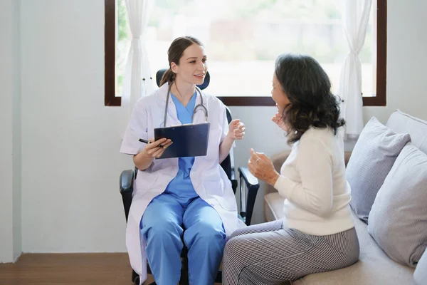 Portrait of a female doctor holding a patient clipboard to discuss and analyze the patients condition before treating