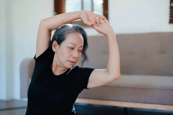 stress relief, muscle relaxation, breathing exercises, exercise, meditation, portrait of Young Asian woman relaxing her body from by practicing yoga