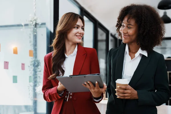 stock image Multiethnic business, Beautiful American African with asian businesswomans people in meeting. Accountant people do document, tax, exchange, accounting and Financial advisor.