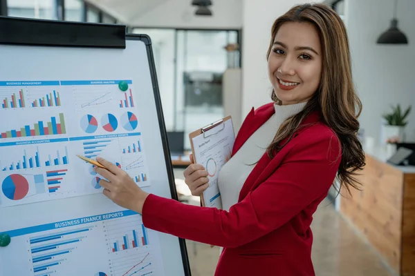 stock image Portrait young business woman presentation marketing profit with confident within investment and seminar for planning of finance.