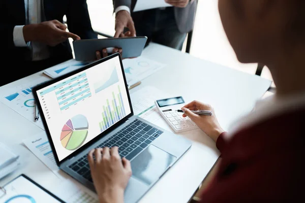 stock image Team business adviser meeting to analyze and discuss the situation on the financial report n the meeting room with using computer laptop, documents, calculator in work