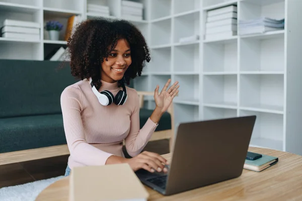 Video call or conference, african american university foreign exchange students study online on laptop pc english language class Exchange Program by international specialists with master at home.