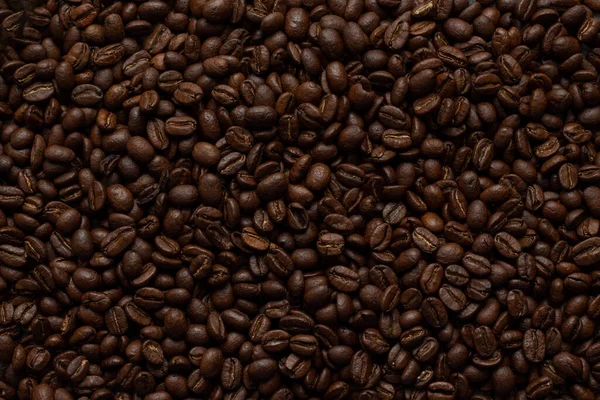 Fresh coffee bean background - texture of coffee beans