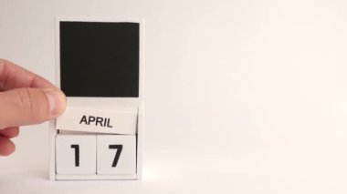 17 Nisan tarihli takvim ve tasarımcılar için bir yer. Belirli bir tarihteki olay için illüstrasyon.
