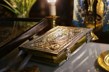 The Gospel lies on the throne during the church service.