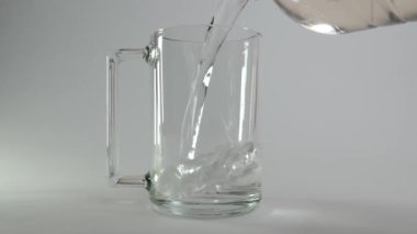 Before taking the pill, drop it into a glass of water, where it fizzes as it dissolves in the water.