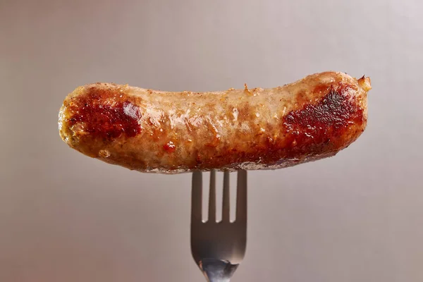 Fried Ruddy Pork Sausage Strung Fork Concept Delicious Meat Dish — Stok fotoğraf
