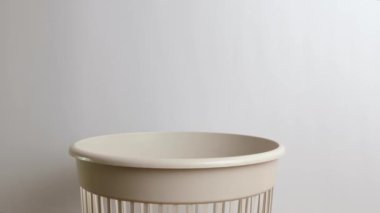 The disposable syringe is thrown into the trash for disposal and recycling. View from below. The concept of disposal and recycling.