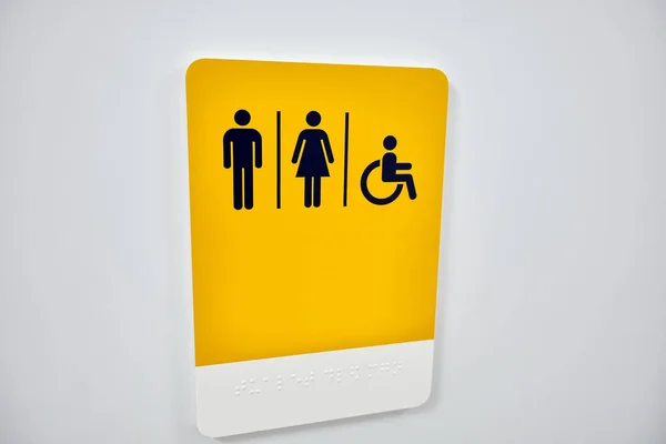 Znak Wskazujący Mężczyznę Kobietę Osobę Niepełnosprawnością Fizyczną Napis Języku Brajlowskim — Zdjęcie stockowe