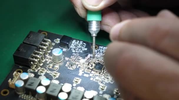 Desoldering Chip Using C115 Soldering Iron Maintenance Repair Computer Equipment — Stock Video