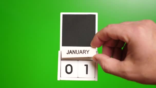 切断のための緑の背景にある1月1日付の日付のカレンダー 特定の日付のイベントのイラスト — ストック動画