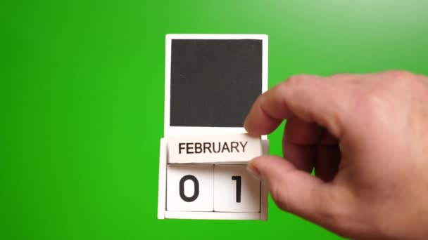 日期为2月1日的日历 绿色背景为切割日期 特定日期事件的说明性说明 — 图库视频影像