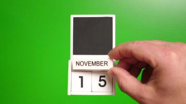 15 Kasım tarihli takvim yeşil arka planda. Belirli bir tarihteki olay için illüstrasyon.