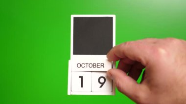 19 Ekim tarihli takvim yeşil arka planda. Belirli bir tarihteki olay için illüstrasyon.