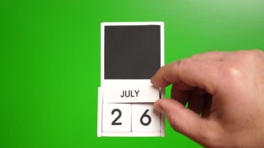 26 Temmuz tarihli takvim yeşil arka planda. Belirli bir tarihteki olay için illüstrasyon.