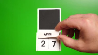 Takvim 27 Nisan 'da yeşil arka planda. Belirli bir tarihteki olay için illüstrasyon.