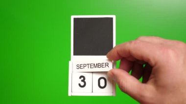 Takvim 30 Eylül 'de yeşil arka planda. Belirli bir tarihteki olay için illüstrasyon.