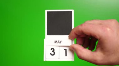 Yeşil arka planda 31 Mayıs tarihli takvim. Belirli bir tarihteki olay için illüstrasyon.
