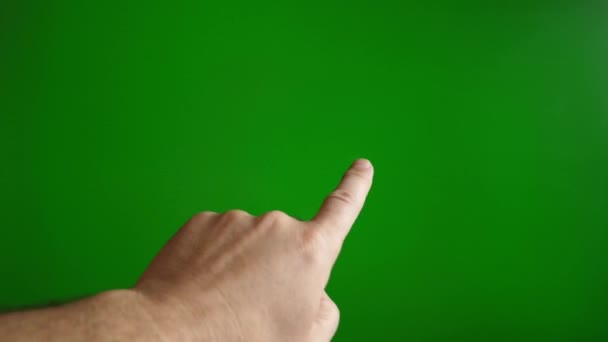 緑色の背景にある男の手がスクロールアップします タッチスクリーンの概念 — ストック動画
