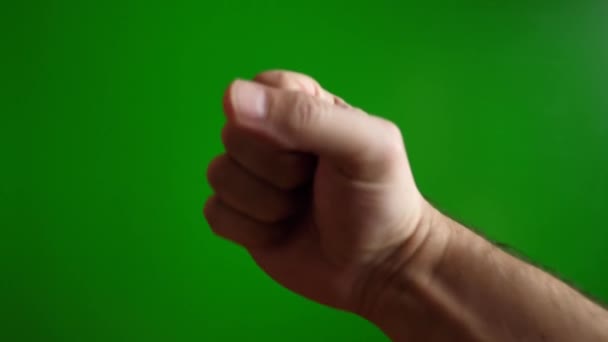 Чоловік Робить Кулак Зеленому Тлі Концепція Прояву Сили — стокове відео