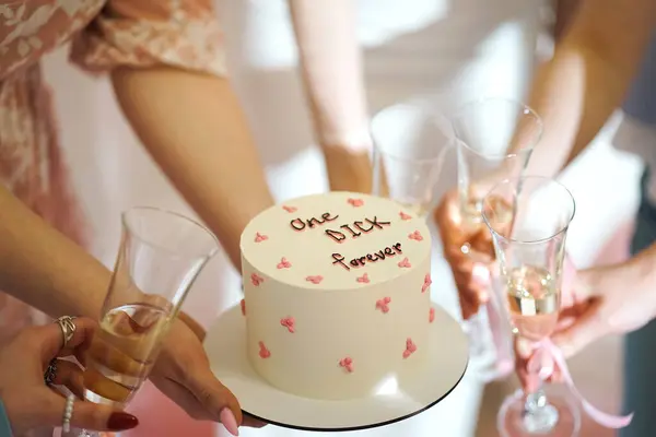 Cake for a hen party with the inscription \