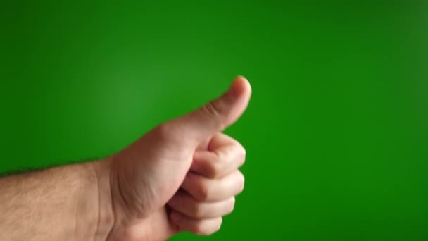 Human Hand Showing Thumb Bad Gesture Green Background — Stock Video