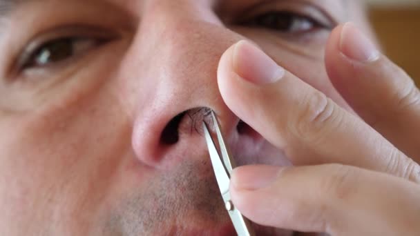 Man Cuts His Nose Hair Scissors — Stock Video