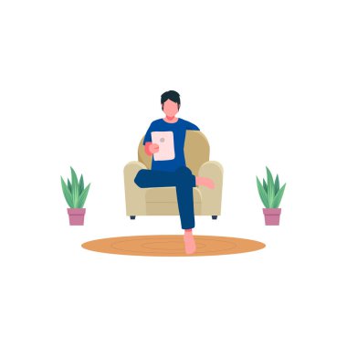 Çocuk kanepede Tab 'le oturuyor..