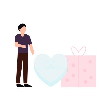 Çocuk şükran günü hediyeleri ve çikolatalarının yanında duruyor..