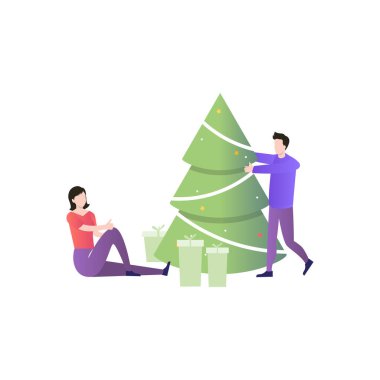 Oğlan ve kız Noel için dekore ediyorlar..