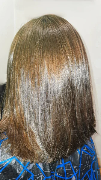 Hair coloring and cuttingHair coloring and cutting. Hairstyling in a beauty salon. Hair close-up. copy space.