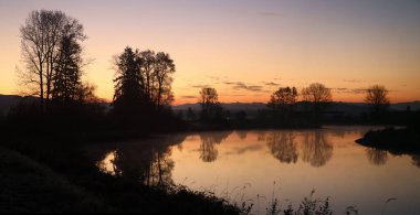 Morning shadows during tranquil sunrise clipart