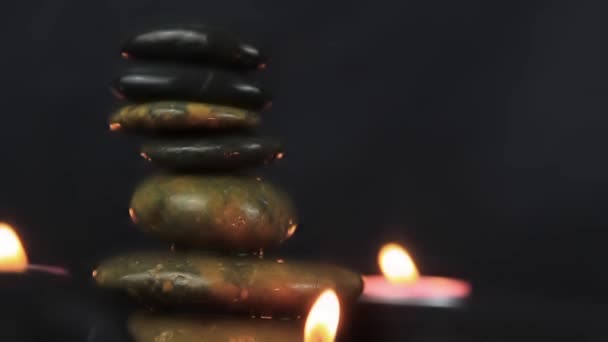 Two Burning Wax Candles Small Stones Dark Use Relaxing Time — Stock videók