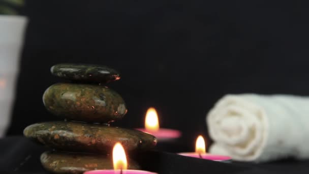 Two Burning Wax Candles Small Stones Dark Use Relaxing Time — Stock Video