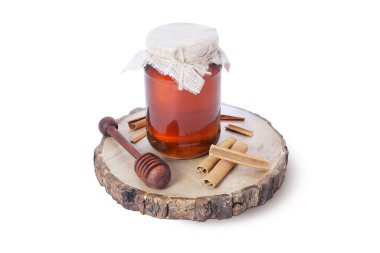 Tarçın Çubukları ve Tahta Ballı Organik Bal Kavanozu Kırsal Tahta Sağlıklı ve Dokunulmazlığı Artıran Doğal Tahta Tahta Üzerinde