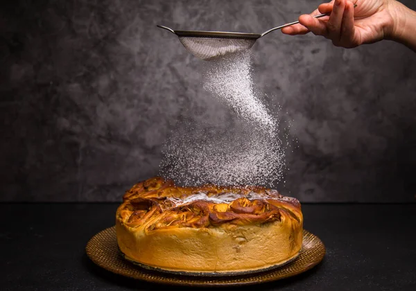 Apple Pie. Powdered Sugar. Dark Background. An Apple Pie With Sifted Sugar Powder