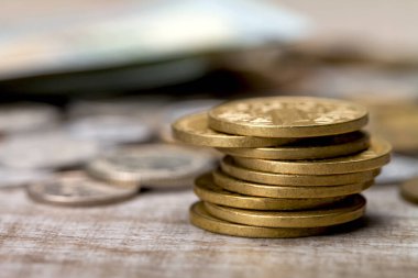 Pyramid of coins. Column of metal coins. The concept of saving