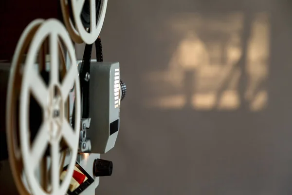 stock image Vintage 8mm Film Projector. Cinema projector and blurry image on the screen. Soft focus. Blurry focus. Motion blur