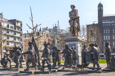 AMSTERDAM, NETHERLANDS - MAY 5, 2013: This is a monument to Rembrandt, surrounded by the sculptural characters of his painting 'The Night Watch'.